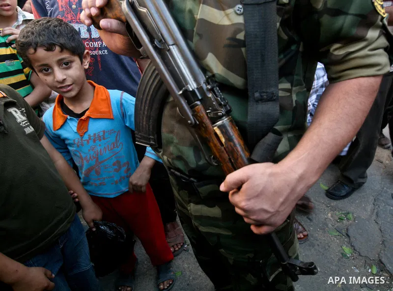 Palestinian Islamic Jihad militants attend the funeral of 12 Palestinian militants transferred from Israel, in Gaza City, Thursday, May 31, 2012. Israel transferred the bodies in an effort to induce Palestinian President...
