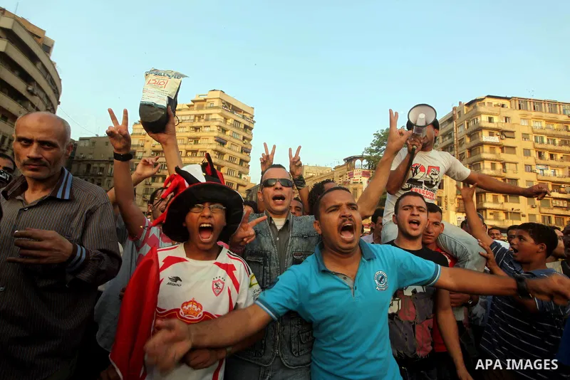 Egyptian protesters chant slogans against Egyptian presidential candidate Ahmed Shafiq in Tahrir Square decrying the result of the first round of voting in the Egyptian presidential election in Cairo, Egypt, Friday, June...