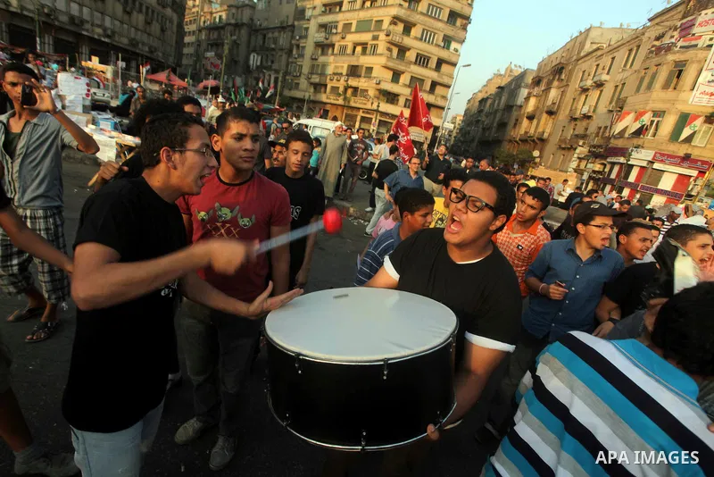 Egyptian protesters chant slogans against Egyptian presidential candidate Ahmed Shafiq in Tahrir Square decrying the result of the first round of voting in the Egyptian presidential election in Cairo, Egypt, Friday, June...