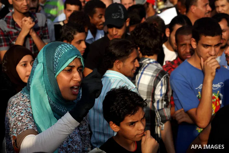 Egyptian protesters chant slogans against Egyptian presidential candidate Ahmed Shafiq in Tahrir Square decrying the result of the first round of voting in the Egyptian presidential election in Cairo, Egypt, Friday, June...