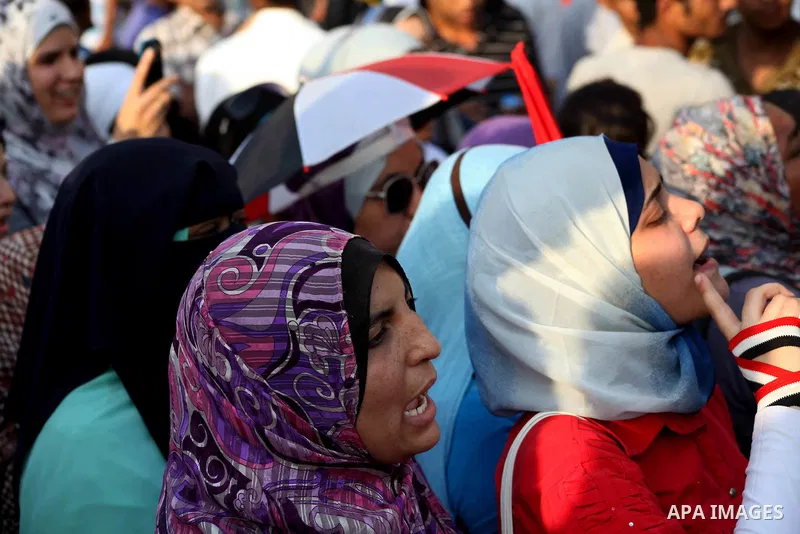 Egyptian protesters chant slogans against Egyptian presidential candidate Ahmed Shafiq in Tahrir Square decrying the result of the first round of voting in the Egyptian presidential election in Cairo, Egypt, Friday, June...