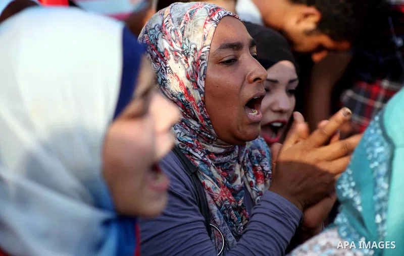 Egyptian protesters chant slogans against Egyptian presidential candidate Ahmed Shafiq in Tahrir Square decrying the result of the first round of voting in the Egyptian presidential election in Cairo, Egypt, Friday, June...