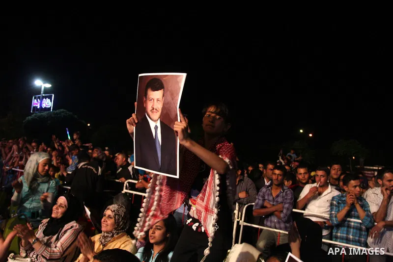 Jordanians take part ceremony "Independence Day" of the Hashemite Kingdom of Jordan in the gardens of Al-Hussein in Amman, on June 01, 2012. Photo by Issam Rimawi