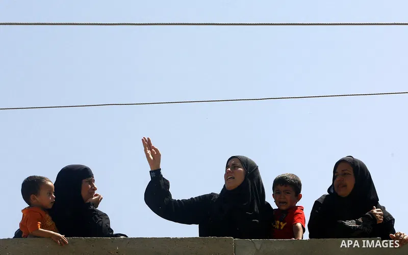 Relatives of Palestinian gunman Ahmed Nassir mourn during his funeral in Khan Younis in the southern Gaza Strip June 2, 2012. A Palestinian gunman, Ahmed Nassir, broke into Israel on Friday and killed a soldier before be...