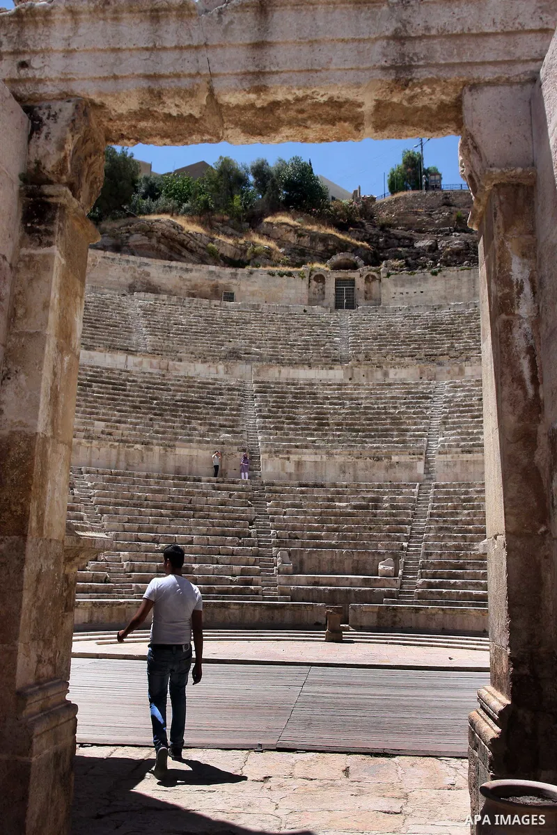 Foreign tourists in the Roman amphitheatre in Amman, Jordan, June 2, 2012. Amphitheatre of the most important Roman monuments in Amman, was built 161 years AD. Photo by Issam Rimawi