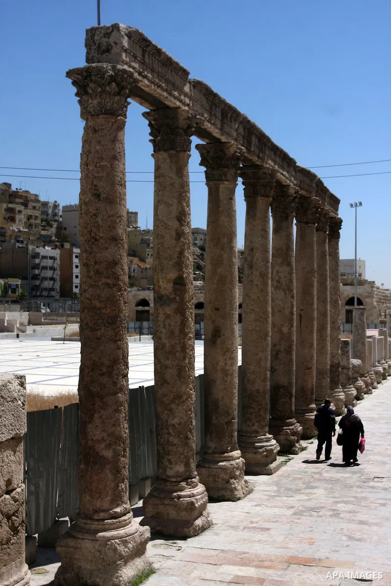 Foreign tourists in the Roman amphitheatre in Amman, Jordan, June 2, 2012. Amphitheatre of the most important Roman monuments in Amman, was built 161 years AD. Photo by Issam Rimawi