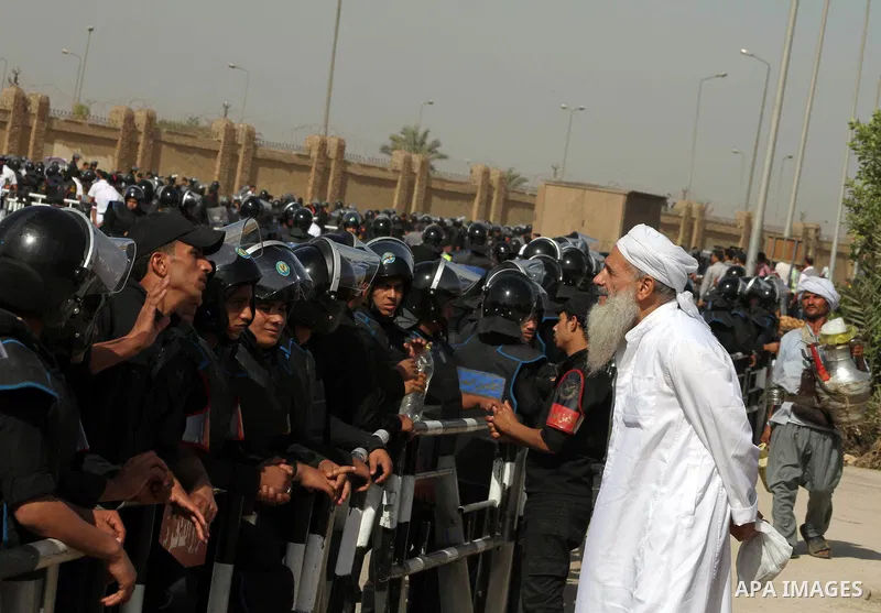 Relatives of people who died during Egypt's revolution react after a court sentenced deposed president Hosni Mubarak to life in prison, outside the police academy where the court is located in Cairo June 2, 2012. Mubarak...