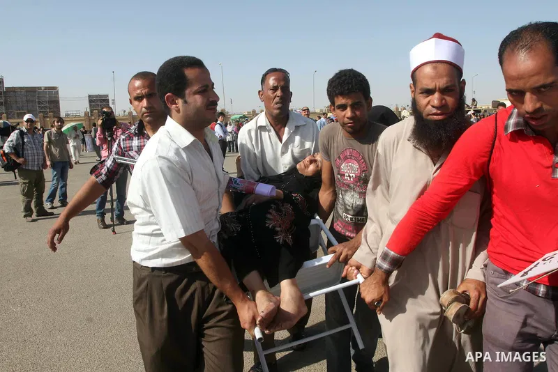 Relatives of people who died during Egypt's revolution react after a court sentenced deposed president Hosni Mubarak to life in prison, outside the police academy where the court is located in Cairo June 2, 2012. Mubarak...