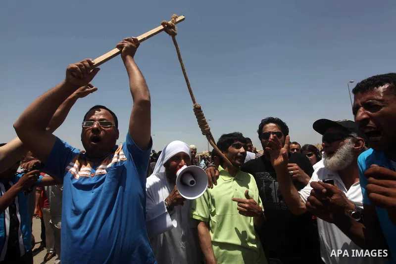 Relatives of people who died during Egypt's revolution react after a court sentenced deposed president Hosni Mubarak to life in prison, outside the police academy where the court is located in Cairo June 2, 2012. Mubarak...