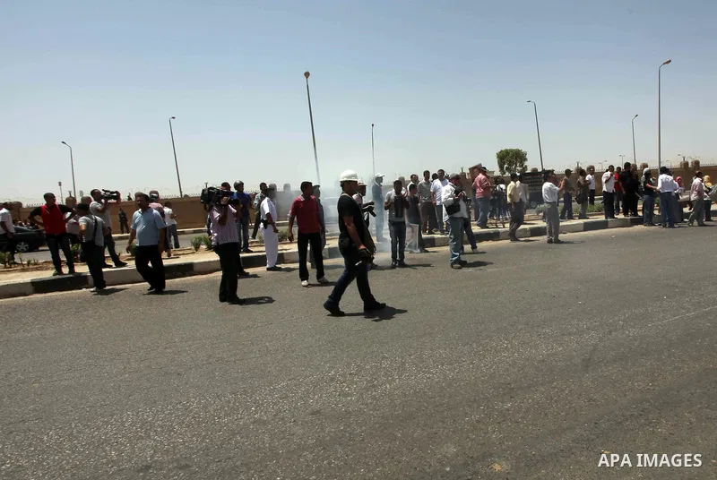 Anti-Mubarak protesters clash with riot police after a court sentenced deposed president Hosni Mubarak to life in prison, outside the police academy where the court is located in Cairo June 2, 2012. Mubarak was sentenced...