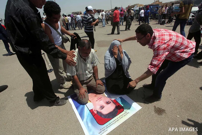 Relatives of people who died during Egypt's revolution react after a court sentenced deposed president Hosni Mubarak to life in prison, outside the police academy where the court is located in Cairo June 2, 2012. Mubarak...