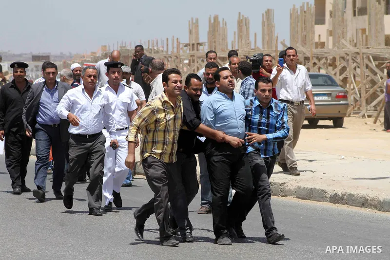 Anti-Mubarak protesters clash with riot police after a court sentenced deposed president Hosni Mubarak to life in prison, outside the police academy where the court is located in Cairo June 2, 2012. Mubarak was sentenced...