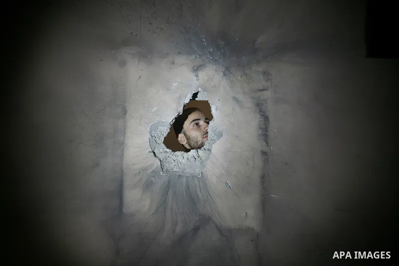A Palestinian man inspects a destroyed house after an Israeli missile strike in Al-Nussirat Refugee Camp in central Gaza Strip, 03 June 2012. According to news reports, seven Palestinians were wounded in a series of Isra...