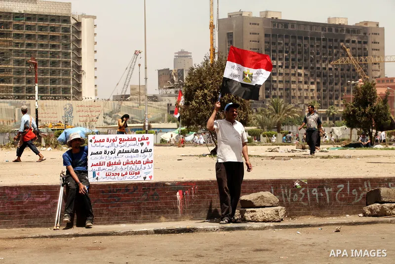 Egyptian protesters gather in Cairo's landmark Tahrir Square on June 3, 2012. Hundreds of demonstrators are occupying Tahrir Square after a court sentenced ousted president Hosni Mubarak and his interior minister Habib a...