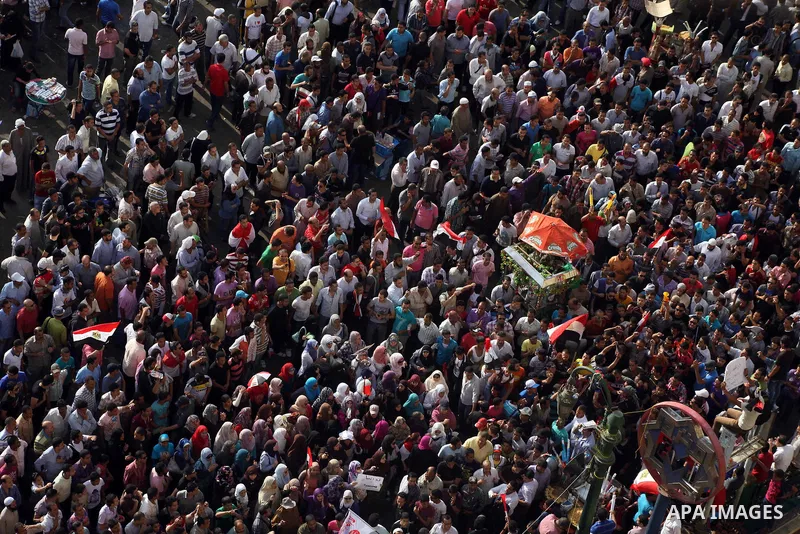 Egyptian protesters demonstrate a day after a court sentenced deposed president Hosni Mubarak to life in prison, at Tahrir Square in Cairo June 3, 2012. Egyptian pro-democracy campaigners called for a new uprising on Sun...