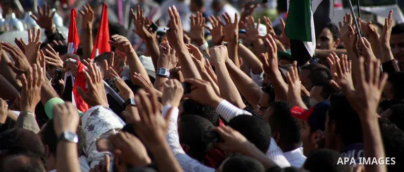 Protesters wave Egypt's flags during a demonstration at Tahrir square in Cairo, against the verdict for deposed leader Hosni Mubarak June 4, 2012. Egyptian pro-democracy campaigners called on Sunday for a new uprising, s...