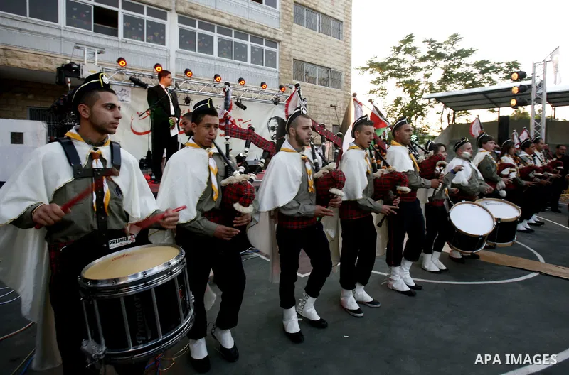 Palestinians watch a ceremony and performance commemorating the 1967 setback in Jerusalem on June 04,2012. Students movement homeland of the Hebrew University salutes the anniversary of the setback in 1967. The setback i...