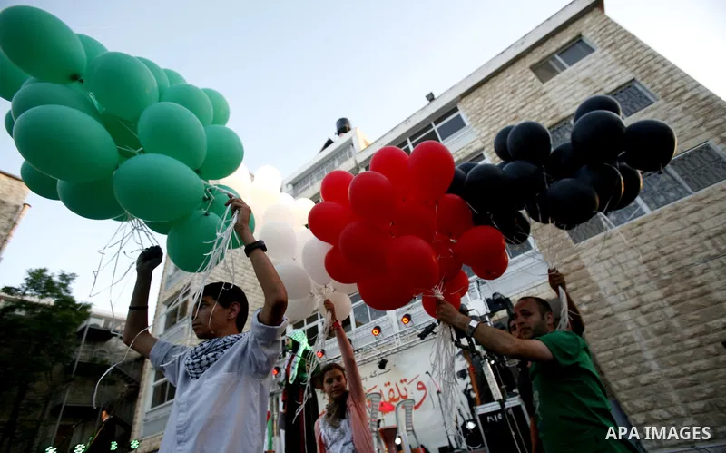 Palestinians watch a ceremony and performance commemorating the 1967 setback in Jerusalem on June 04,2012. Students movement homeland of the Hebrew University salutes the anniversary of the setback in 1967. The setback i...