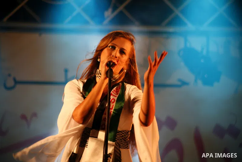 Palestinians watch a ceremony and performance commemorating the 1967 setback in Jerusalem on June 04,2012. Students movement homeland of the Hebrew University salutes the anniversary of the setback in 1967. The setback i...