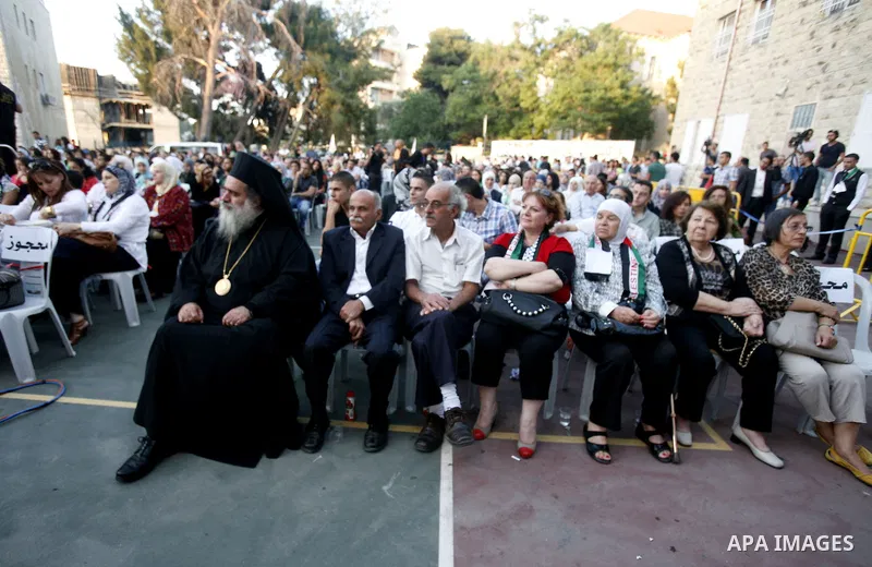 Palestinians watch a ceremony and performance commemorating the 1967 setback in Jerusalem on June 04,2012. Students movement homeland of the Hebrew University salutes the anniversary of the setback in 1967. The setback i...