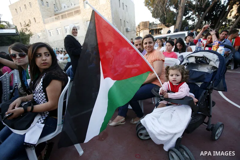 Palestinians watch a ceremony and performance commemorating the 1967 setback in Jerusalem on June 04,2012. Students movement homeland of the Hebrew University salutes the anniversary of the setback in 1967. The setback i...