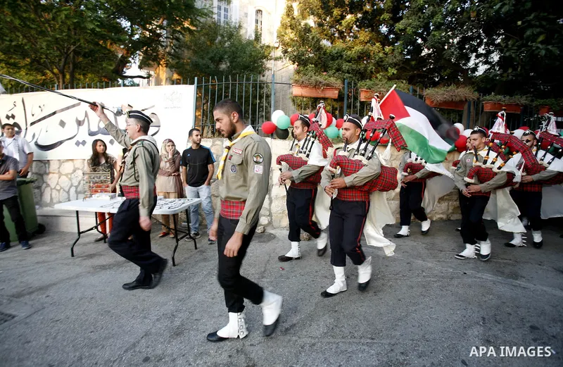 Palestinians watch a ceremony and performance commemorating the 1967 setback in Jerusalem on June 04,2012. Students movement homeland of the Hebrew University salutes the anniversary of the setback in 1967. The setback i...