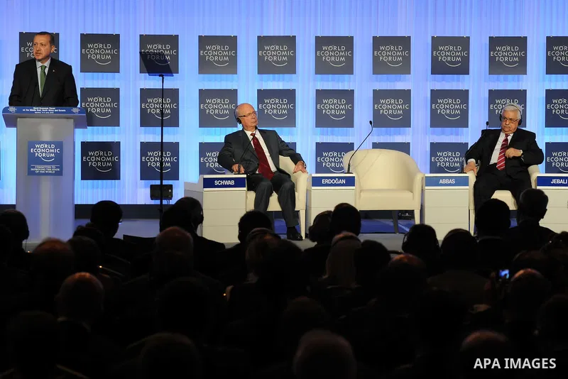 Turkish Prime Minister Recep Tayyip Erdogan (L-R) addresses the participants at the World Economic Forum (WEF) on the Middle East, North Africa and Eurasia 2012, as WEF's founder and executive chairman Klaus Schwab, Pale...