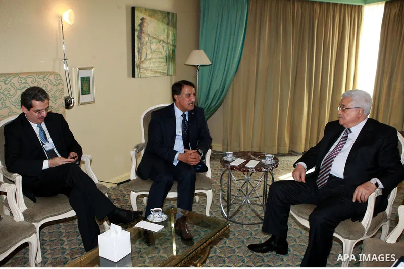 Palestinian President Mahmoud Abbas (Abu Mazen) meets with Chairman of the Board of Directors of Qatar Telecom, Sheikh Abdullah Al-Thani on June 05, 2012. Photo by Thaer Ganaim
