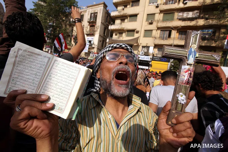 Egyptian protesters shout slogans against former President Hosni Mubarak and his aides during the protests after the announcement of the verdict in their trial, at Tahrir square, Cairo, Egypt, 05 June 2012. Opposition gr...