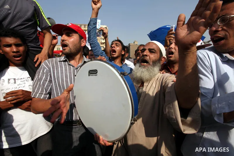 Egyptian protesters shout slogans against former President Hosni Mubarak and his aides during the protests after the announcement of the verdict in their trial, at Tahrir square, Cairo, Egypt, 05 June 2012. Opposition gr...