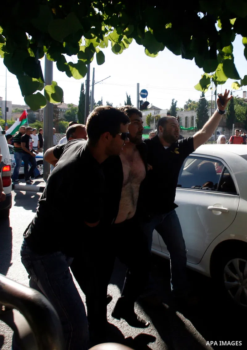 Israeli police arrest a Palestinian protester during a demonstration marking the 'Naksa Day' at the Damascus Gate on 05 June 2012. Naksa Day is the annual day of commemoration for the Palestinian people of the displaceme...