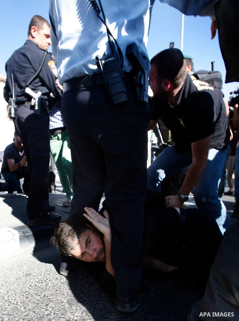 Israeli police arrest a Palestinian protester during a demonstration marking the 'Naksa Day' at the Damascus Gate on 05 June 2012. Naksa Day is the annual day of commemoration for the Palestinian people of the displaceme...