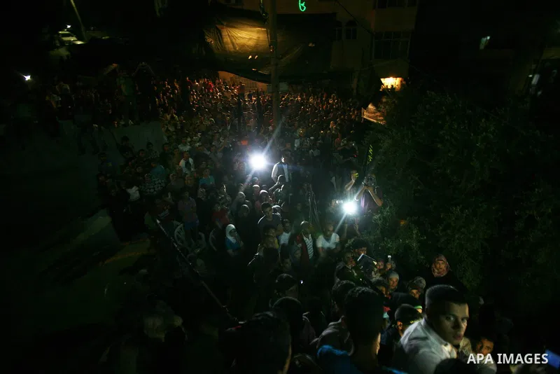 Palestinians celebrate after the Israeli authorities released prisoner Thaer Halahleh in the West Bank Village of Kharas near Hebron on June 05, 2012. Thaer Halahla, 33, from Hebron was in administrative detention for th...