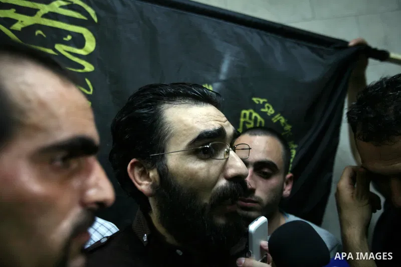 Thaer Halahleh talks to press after the Israeli authorities released him in the West Bank Village of Kharas near Hebron on June 05, 2012. Thaer Halahla, 33, from Hebron was in administrative detention for the past 24 mon...