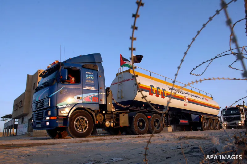 A fuel tanker arrives at Rafah border crossing with Egypt on June 07, 2012. Israel allowed five fuel tankers from Qatari oil to cross into the Gaza Strip on Thursday to ease a severe power shortage triggered by a dispute...