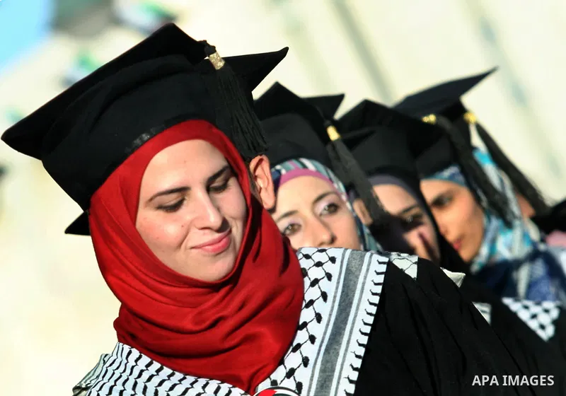 Palestinian students celebrate during the 32nd Graduation Ceremony at Al - Najah University in The West Bank City of Nablus on 07 June 2012. Al - Najah University is a Palestinian non-governmental public university gover...