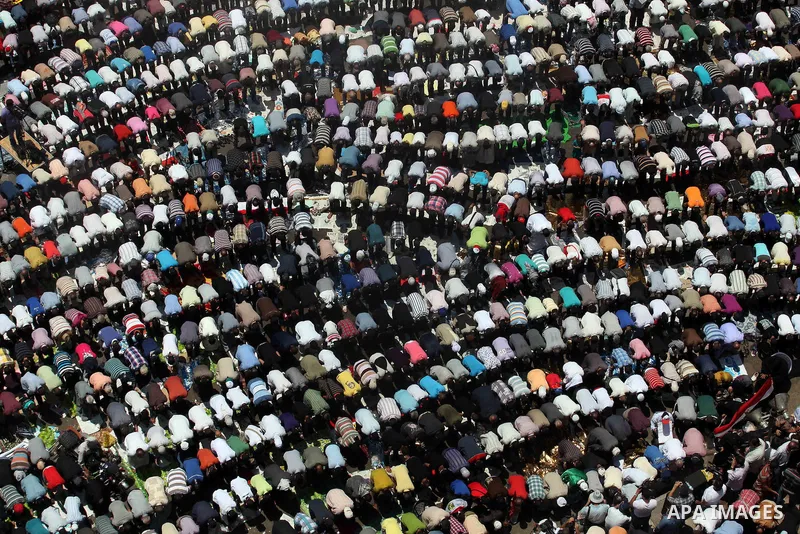 Egyptian Protesters gather for Friday prayers before a demonstration against presidential candidate Ahmed Shafiq in central Cairo's Tahrir Square, as hundreds of people gathered after the Friday noon prayer on June 8, 20...