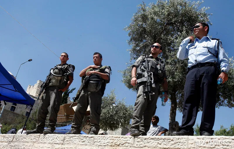 Mounted Israeli police stand during a Palestinian protest against continuing of 'Judaization of Jerusalem' by Jewish settlers and confiscating Palestinian lands at Damascus gate after Friday prayer in east jerusalem, on...
