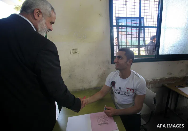 Palestinian Prime Minister in Gaza Strip, Ismail Haniya, visits students as they sit for their final high school exams, known as "Tawjihi", in Gaza City on June 09, 2012. Photo by Yasser Fathi