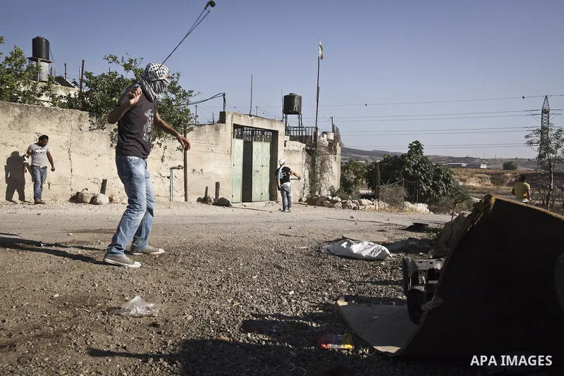 June 9, 2012 - Beit Nuba, West Bank - On the 45th commemoration of Naksa, the Popular Struggle Coordination Commitee have organized a march toward the Latroon destroyed villages of Yalu, Omwas and Beit Nuba. .Clashes wit...