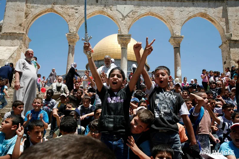 Palestinian children participate in summer camps at Al-Aqsa mosque in the old city of Jerusalem on 12 June 2012. Photo by Mahfouz Abu Turk