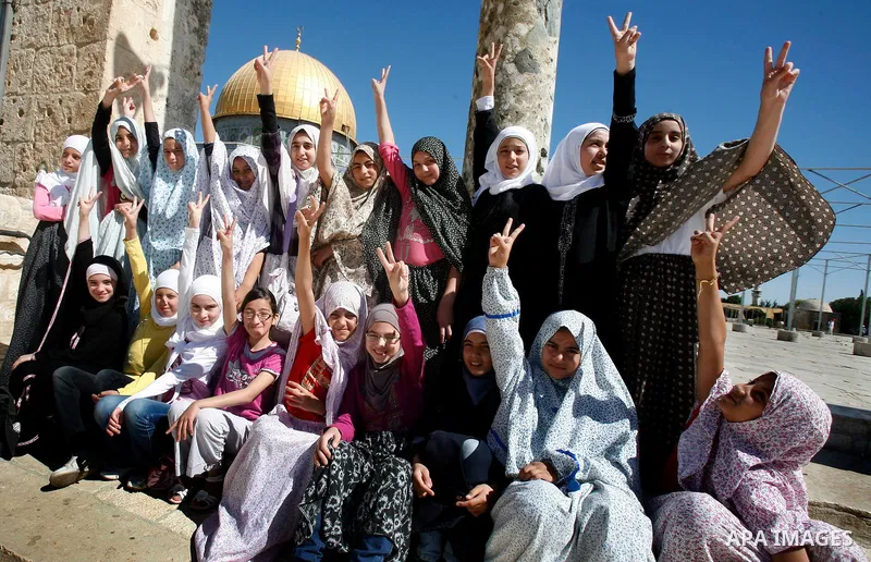 Palestinian children participate in summer camps at Al-Aqsa mosque in the old city of Jerusalem on 12 June 2012. Photo by Mahfouz Abu Turk