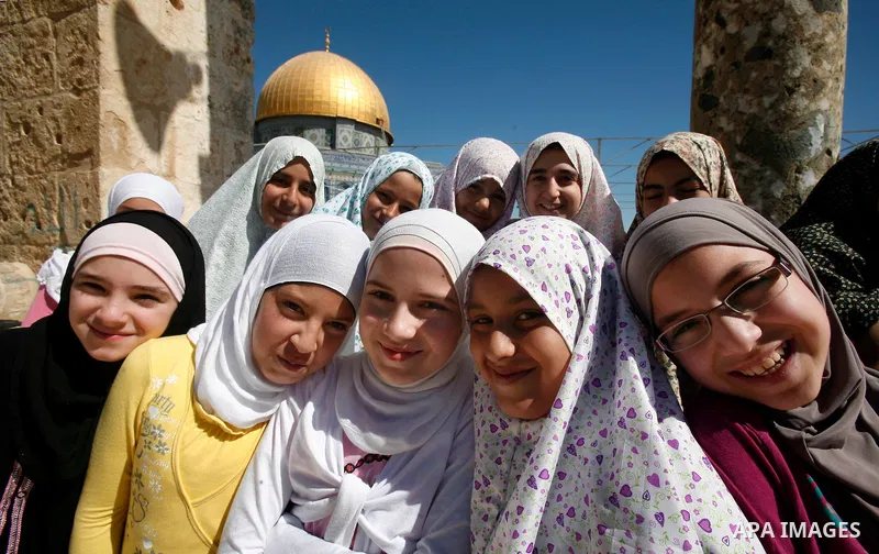 Palestinian children participate in summer camps at Al-Aqsa mosque in the old city of Jerusalem on 12 June 2012. Photo by Mahfouz Abu Turk