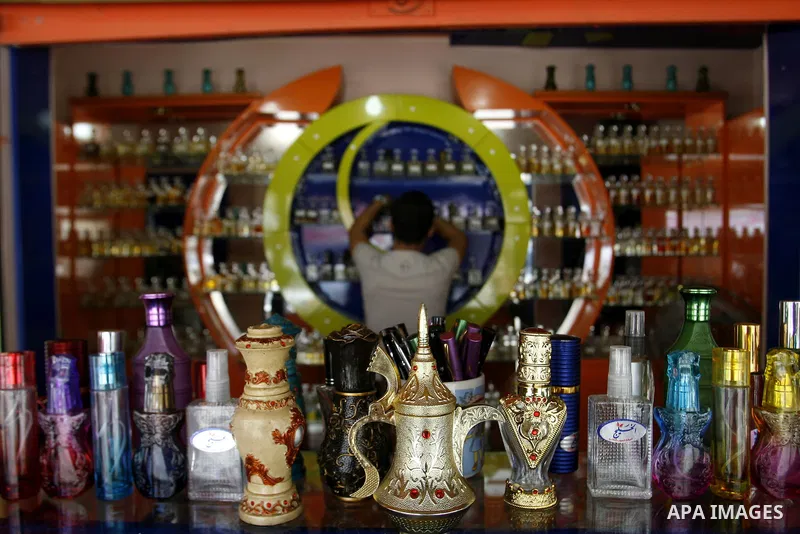 Palestinian vendor prepare perfumes in his shop for perfumes at market Rafah, southern Gaza city, on June 13, 2012. The European Union's envoy to the Palestinian Authority confirmed its support and allegiance to the peop...