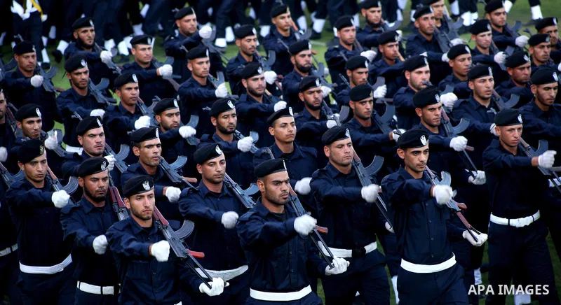 Graduating police officers march during a ceremony at the police academy in Gaza City on June 13, 2012, making them the first batch of officers to graduate after four years of training under the Hamas leadership. Hamas h...