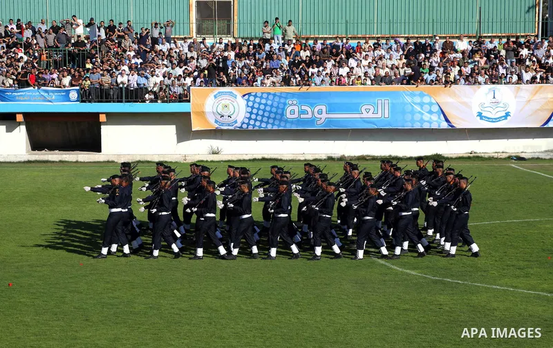 Graduating police officers march during a ceremony at the police academy in Gaza City on June 13, 2012, making them the first batch of officers to graduate after four years of training under the Hamas leadership. Hamas h...