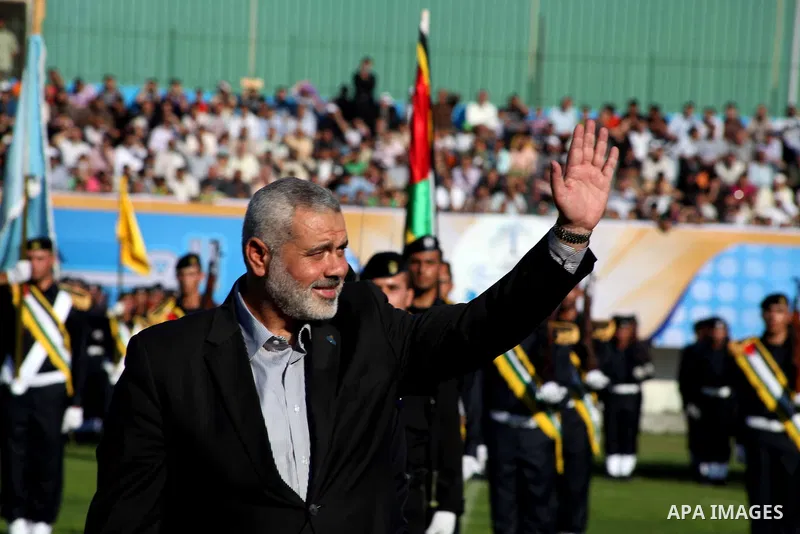 Palestinian Prime Minister in Gaza Ismail Hanyeh, participates graduation police officers ceremony at the police academy in Gaza City on June 13, 2012, making them the first batch of officers to graduate after four years...
