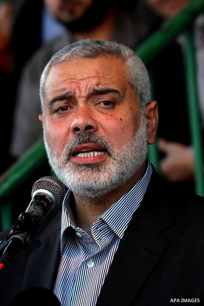 Palestinian Prime Minister in Gaza Ismail Hanyeh, speaks during a graduation police officers ceremony at the police academy in Gaza City on June 13, 2012, making them the first batch of officers to graduate after four ye...