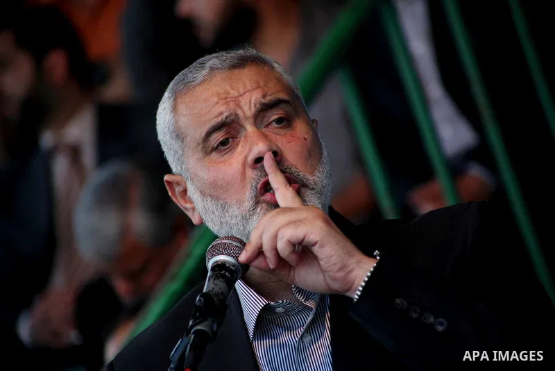 Palestinian Prime Minister in Gaza Ismail Hanyeh, speaks during a graduation police officers ceremony at the police academy in Gaza City on June 13, 2012, making them the first batch of officers to graduate after four ye...