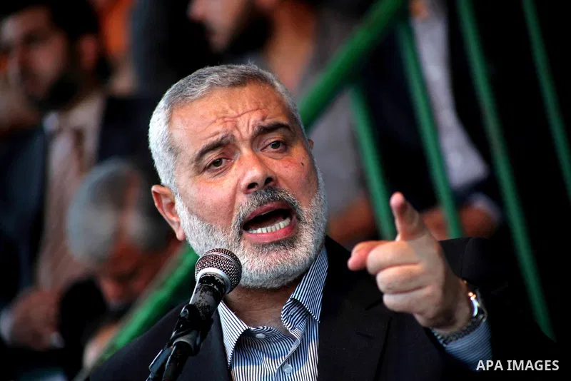 Palestinian Prime Minister in Gaza Ismail Hanyeh, speaks during a graduation police officers ceremony at the police academy in Gaza City on June 13, 2012, making them the first batch of officers to graduate after four ye...